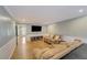 Inviting living room with hardwood floors, wainscoting, neutral paint colors, and comfortable seating at 202 Heights Pl, Canton, GA 30114