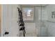 Modern shower with glass doors, a built-in seat, and a sleek, minimalist design at 202 Heights Pl, Canton, GA 30114
