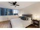 Relaxing bedroom with city views, hardwood floors, and a comfortable king-sized bed at 215 Piedmont Ne Ave # 1109, Atlanta, GA 30308
