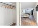Open living space with closet leading into a living room and dining room at 215 Piedmont Ne Ave # 1109, Atlanta, GA 30308