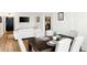Open-concept living and dining area with modern furnishings and ample natural light at 215 Piedmont Ne Ave # 1109, Atlanta, GA 30308