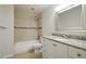 Cozy bathroom featuring a shower-tub combination and granite vanity at 2383 Edgewater Sw Dr, Atlanta, GA 30311