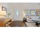 Bright entry featuring a decorative front door, hardwood floors, and an inviting atmosphere at 2383 Edgewater Sw Dr, Atlanta, GA 30311