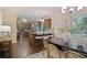 Open concept kitchen and dining area with modern appliances, breakfast bar, and stylish finishes at 2383 Edgewater Sw Dr, Atlanta, GA 30311