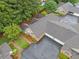 An aerial view of the community showing landscaping and manicured lawns at 4512 Orchard Trce, Roswell, GA 30076