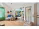 Bright enclosed porch with lots of windows and tile flooring at 4512 Orchard Trce, Roswell, GA 30076