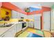 Charming kitchen featuring white appliances, laminate countertops, colorful accents and a decorative ceiling at 4512 Orchard Trce, Roswell, GA 30076