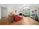 Cozy living room with vaulted ceilings, fireplace, and views of the front yard at 4512 Orchard Trce, Roswell, GA 30076