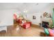 Bright living room with hardwood floors, fireplace, and an open concept design at 4512 Orchard Trce, Roswell, GA 30076