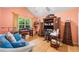 This home office features a vaulted ceiling, large window, and ample storage at 4512 Orchard Trce, Roswell, GA 30076