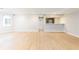 Finished basement featuring neutral walls, recessed lights, and an open layout with a kitchenette at 9360 Nesbit Lakes Dr, Alpharetta, GA 30022