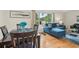 Charming dining area features hardwood floors, a cozy dining set, and plenty of natural light, great for gatherings at 1849 Clay Sw Rd, Mableton, GA 30126