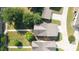Aerial view highlighting the property, its roof, landscaping, and the surrounding neighborhood at 1922 Perry Nw Blvd, Atlanta, GA 30318