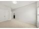 Spacious bedroom with neutral carpet, double door closet, and bright natural light at 1922 Perry Nw Blvd, Atlanta, GA 30318