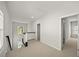 Bright hallway with access to multiple rooms and staircase to a lower level at 1922 Perry Nw Blvd, Atlanta, GA 30318