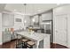 Modern kitchen with granite countertops, stainless steel appliances, and functional island with seating at 1922 Perry Nw Blvd, Atlanta, GA 30318