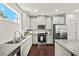Stylish kitchen featuring stainless steel appliances, ample cabinet space, and granite countertops for meal preparation at 1922 Perry Nw Blvd, Atlanta, GA 30318
