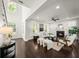 Elegant living room featuring a fireplace, stylish furnishings, and ample natural light for cozy gatherings at 1922 Perry Nw Blvd, Atlanta, GA 30318