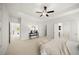 Spacious main bedroom features tray ceiling, ensuite bath, and neutral tones at 1922 Perry Nw Blvd, Atlanta, GA 30318