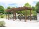 A pergola sits in a park, providing shade and benches at 1922 Perry Nw Blvd, Atlanta, GA 30318
