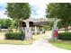 Entrance to Heman E. Perry Park with walking path, picnic pavilion, and playground at 1922 Perry Nw Blvd, Atlanta, GA 30318