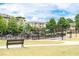 Community playground, benches, and green space located next to residential buildings at 1922 Perry Nw Blvd, Atlanta, GA 30318