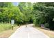 Paved walking trail surrounded by lush greenery and trees at 1922 Perry Nw Blvd, Atlanta, GA 30318