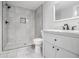 A renovated bathroom featuring a modern vanity, gray tiling, and a glass shower at 2803 3Rd Sw Ave, Atlanta, GA 30315