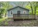 Exterior of home with a wooden deck and a front door at 2803 3Rd Sw Ave, Atlanta, GA 30315