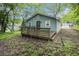 The back of the home features a wooden deck with a lawn at 2803 3Rd Sw Ave, Atlanta, GA 30315