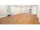 Open concept living room with wood flooring and view to the kitchen at 2803 3Rd Sw Ave, Atlanta, GA 30315