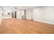 Open concept living room with wood flooring and view to the kitchen at 2803 3Rd Sw Ave, Atlanta, GA 30315
