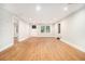 Bright living room features new wood flooring, fresh paint, and natural light at 2803 3Rd Sw Ave, Atlanta, GA 30315