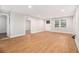 Bright living room features new wood flooring, fresh paint, and natural light at 2803 3Rd Sw Ave, Atlanta, GA 30315