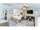 Bonus room featuring a comfortable sofa, exercise bike, and a large TV screen at 4084 Fort Sumter Nw Lndg, Acworth, GA 30101