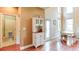 Charming breakfast nook leading to the backyard with a view to a powder room at 4084 Fort Sumter Nw Lndg, Acworth, GA 30101