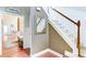 Hallway with staircase and beautiful molding; view to the living and dining area at 4084 Fort Sumter Nw Lndg, Acworth, GA 30101