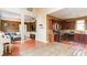 Spacious open-concept living area with hardwood floors, a large kitchen, and a cozy seating area at 4084 Fort Sumter Nw Lndg, Acworth, GA 30101