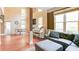 Open-concept living space with hardwood floors, tall ceilings, and lots of natural light at 4084 Fort Sumter Nw Lndg, Acworth, GA 30101
