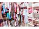 Organized walk-in closet featuring shelving, hanging racks, and ample storage space at 4084 Fort Sumter Nw Lndg, Acworth, GA 30101