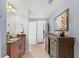 Well-lit bathroom with granite countertop, wooden cabinets, and stylish decor elements at 855 Peachtree Ne St # 501, Atlanta, GA 30308