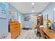 Light blue room featuring a desk, shelving and chest of drawers at 855 Peachtree Ne St # 501, Atlanta, GA 30308