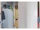 White entry door, metal cabinets, and household items provide organized storage solutions for a tidy interior at 855 Peachtree Ne St # 501, Atlanta, GA 30308
