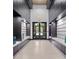 Inviting hallway featuring built-in benches and soft lighting for comfortable and stylish transition at 855 Peachtree Ne St # 501, Atlanta, GA 30308