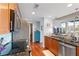 Condo kitchen featuring stainless appliances and granite counters at 855 Peachtree Ne St # 501, Atlanta, GA 30308