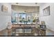 Granite counters accent this condo kitchen with views from the sink at 855 Peachtree Ne St # 501, Atlanta, GA 30308