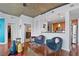 Bright living area open to kitchen, showcasing wood floors and contemporary design elements at 855 Peachtree Ne St # 501, Atlanta, GA 30308