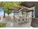 Outdoor kitchen featuring a grill and bar seating is great for entertaining guests while enjoying the weather at 855 Peachtree Ne St # 501, Atlanta, GA 30308