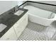 Bathroom showcasing soaking tub and vanity with granite counters at 1539 Beecher Sw St, Atlanta, GA 30310