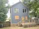 Rear exterior view of home showing deck at 1539 Beecher Sw St, Atlanta, GA 30310